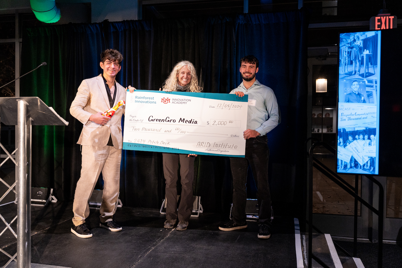 Winners of ARID Special Award at 2024 Pitch Deck Competition, Joshua Zamora-Grigo and Alex Coker, with ARID Co-Director Dr. Jennifer Rudgers 